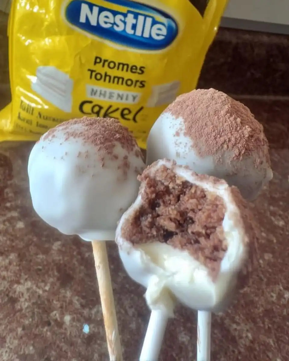 Ingredients for cake balls including yellow cake mix buttercream and white chocolate