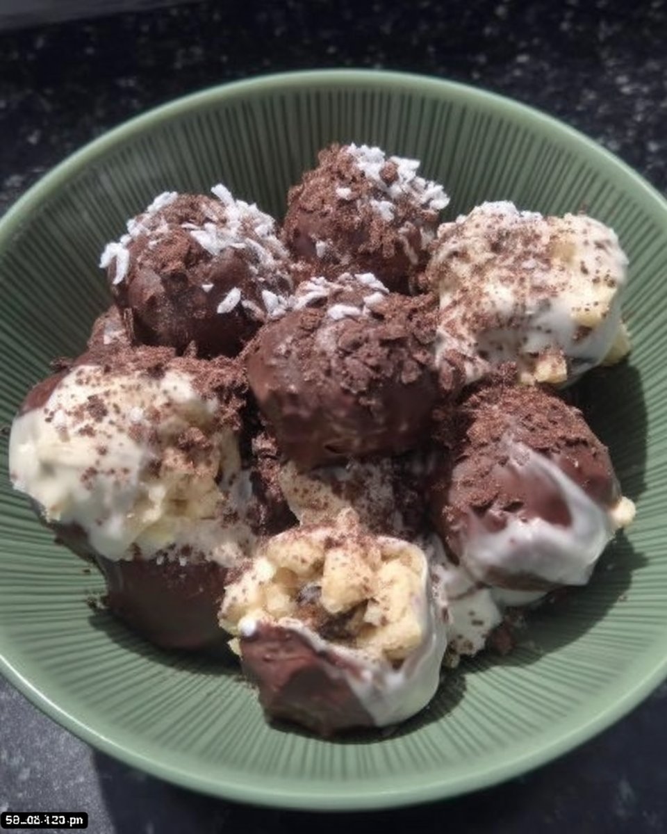 Cake Pops 14 Finished cake pops with sprinkles standing upright in a display block