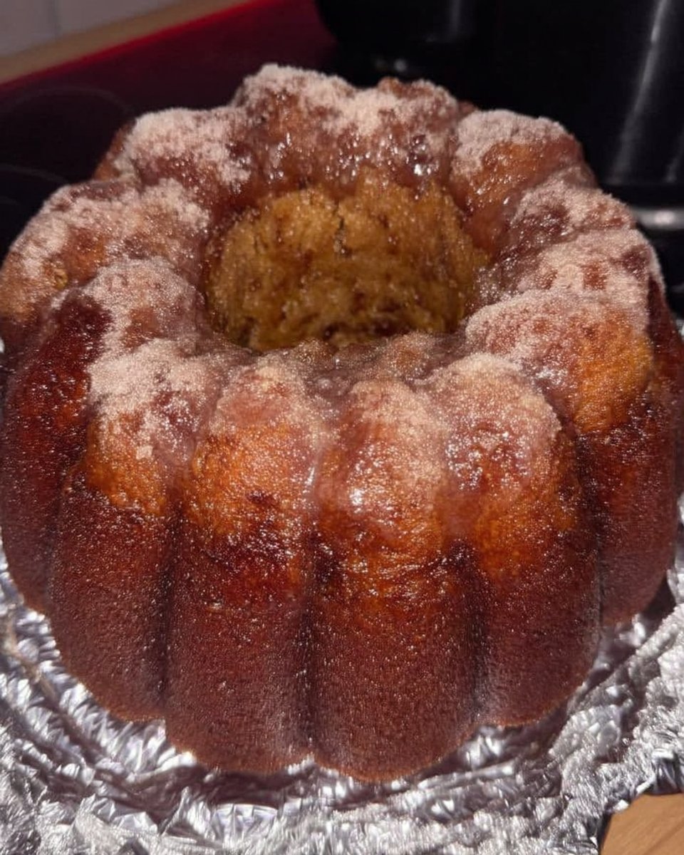 Classic vanilla bundt cake on a rustic wooden table