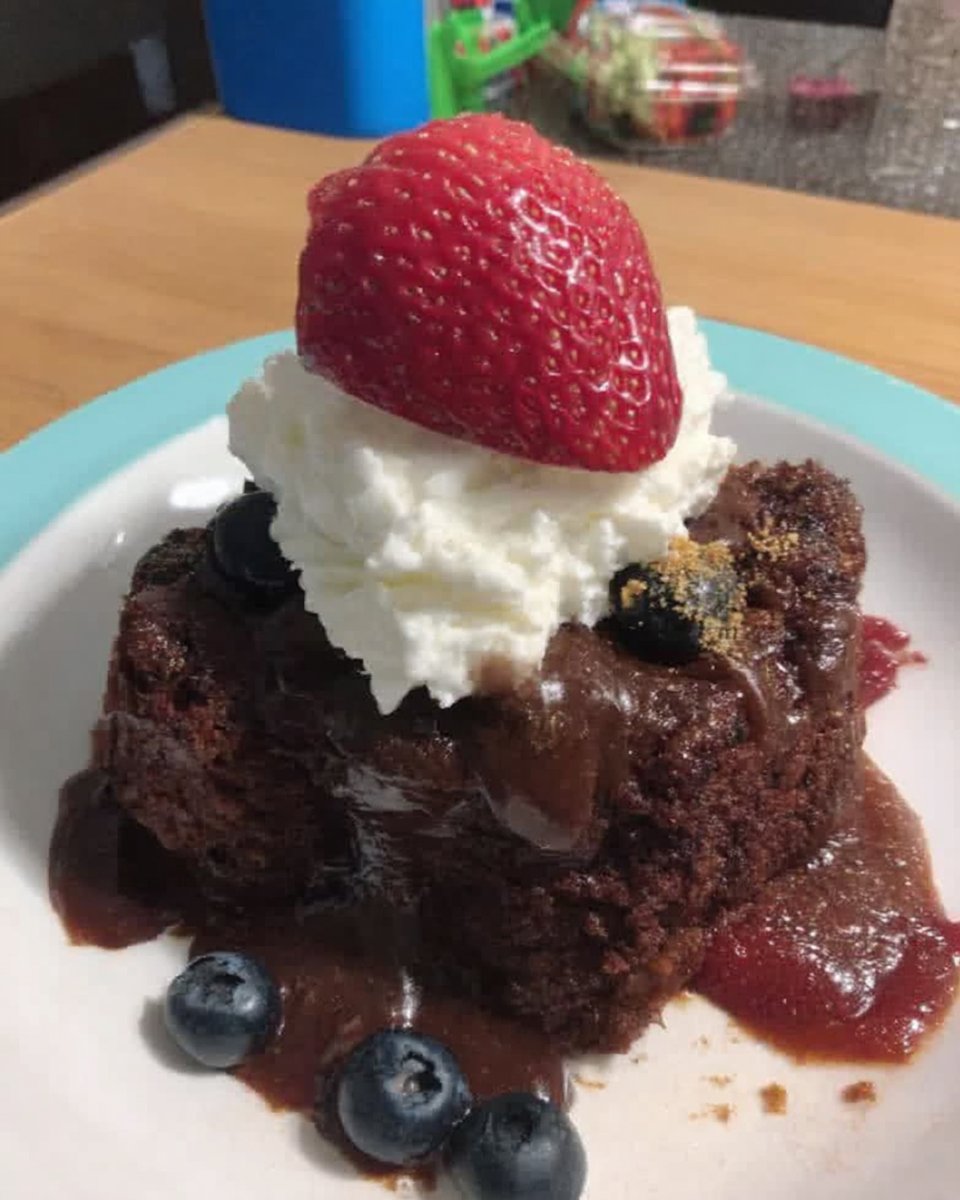 slice of nutella cake showing three distinct sponge layers and buttercream