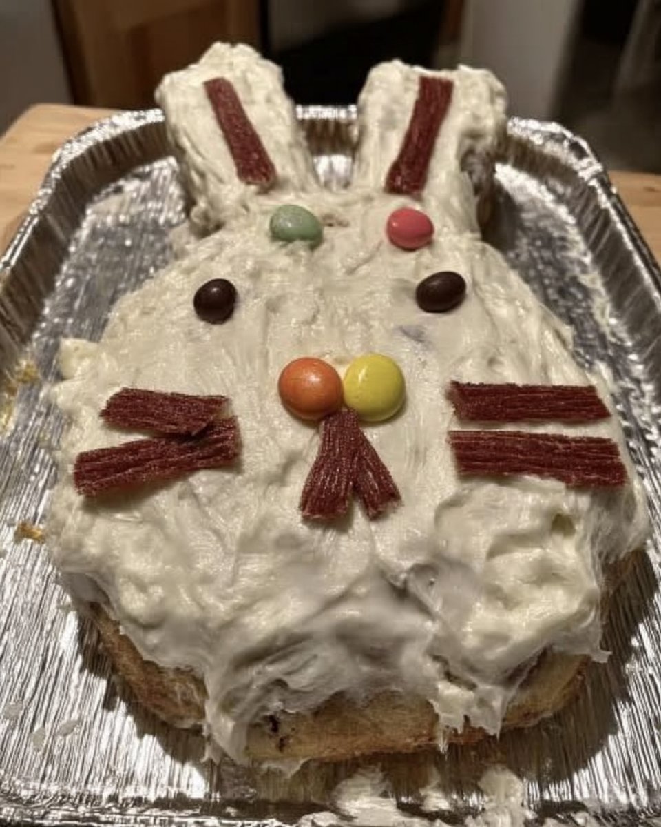 Slice of 3 layer vanilla easter cake on a plate