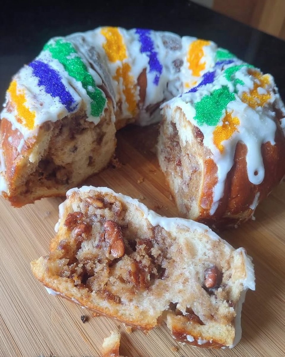 King Cake 14 Slice of king cake served with a hot cup of coffee