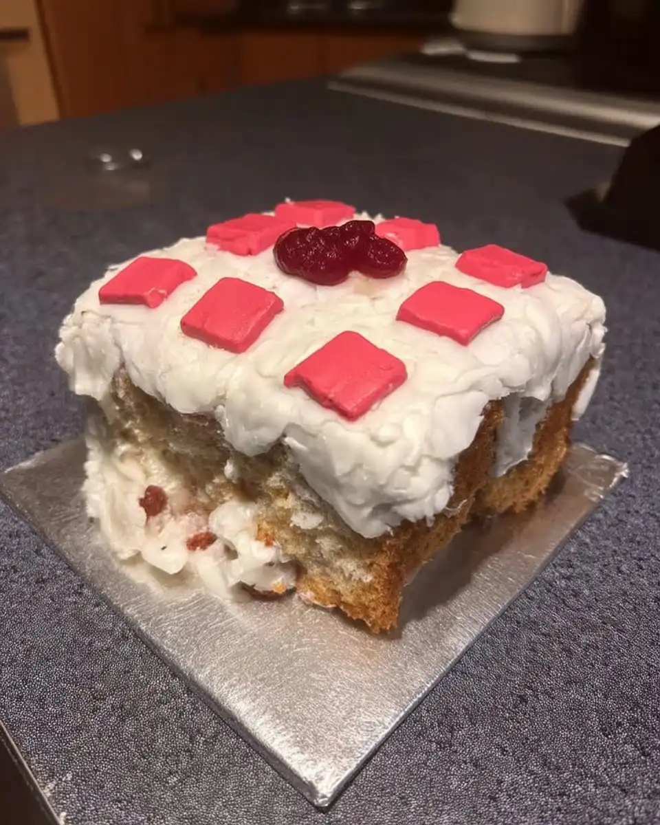 Minecraft Cake 14 Sliced square chocolate cake with cherry jam filling