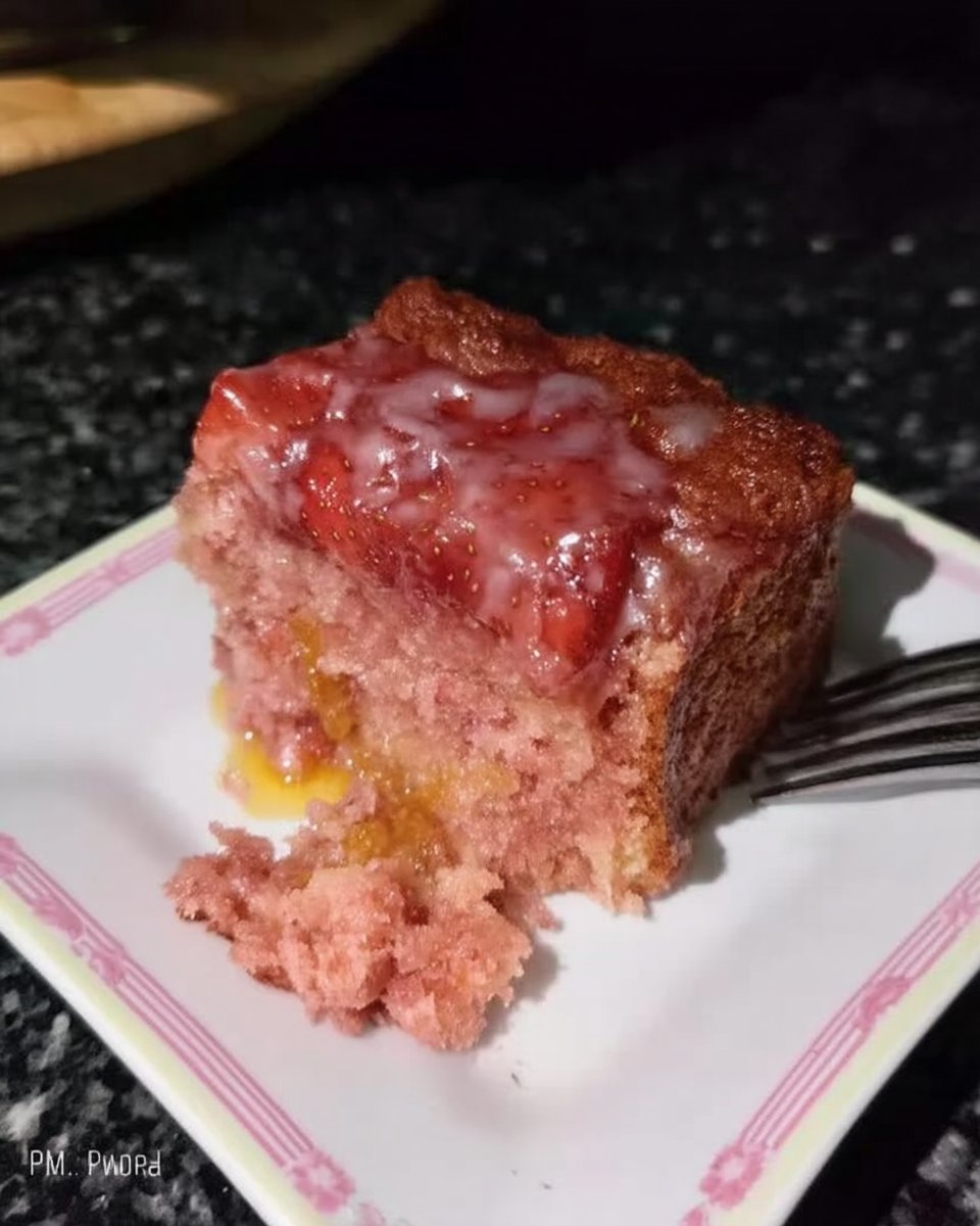 Strawberry Cake 12 Ingredients for strawberry cake including butter eggs flour and fresh strawberries on a wooden table