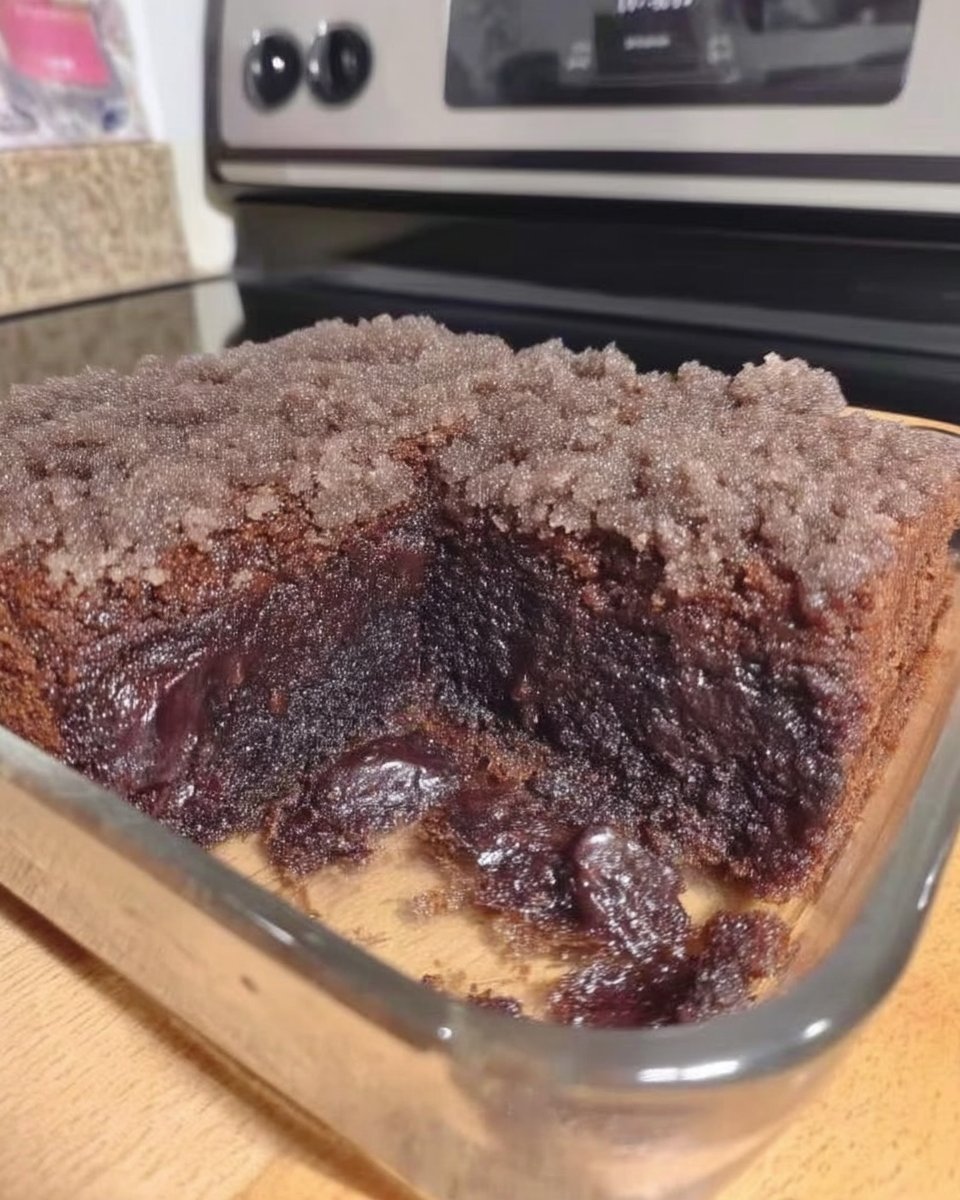 Dry ingredients for depression cake sifted into a square baking pan