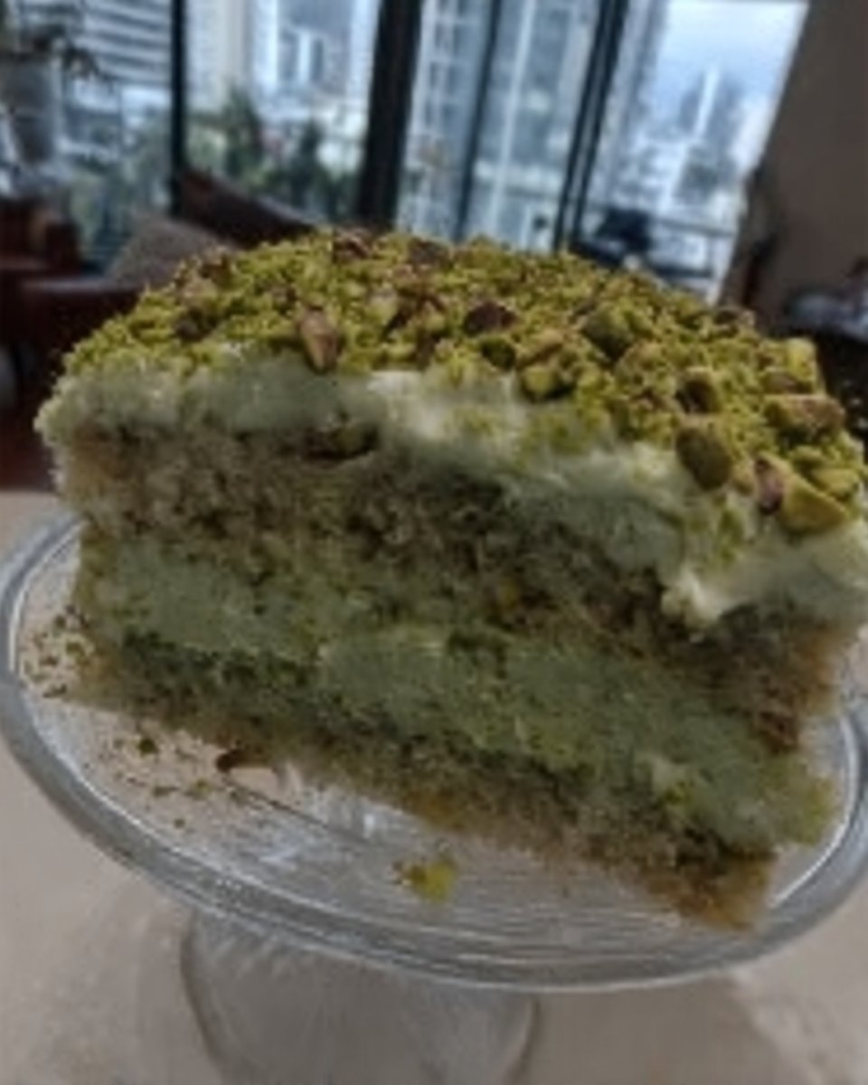 Watergate Cake 14 Whole watergate cake in 9x13 pan topped with coconut and pecans