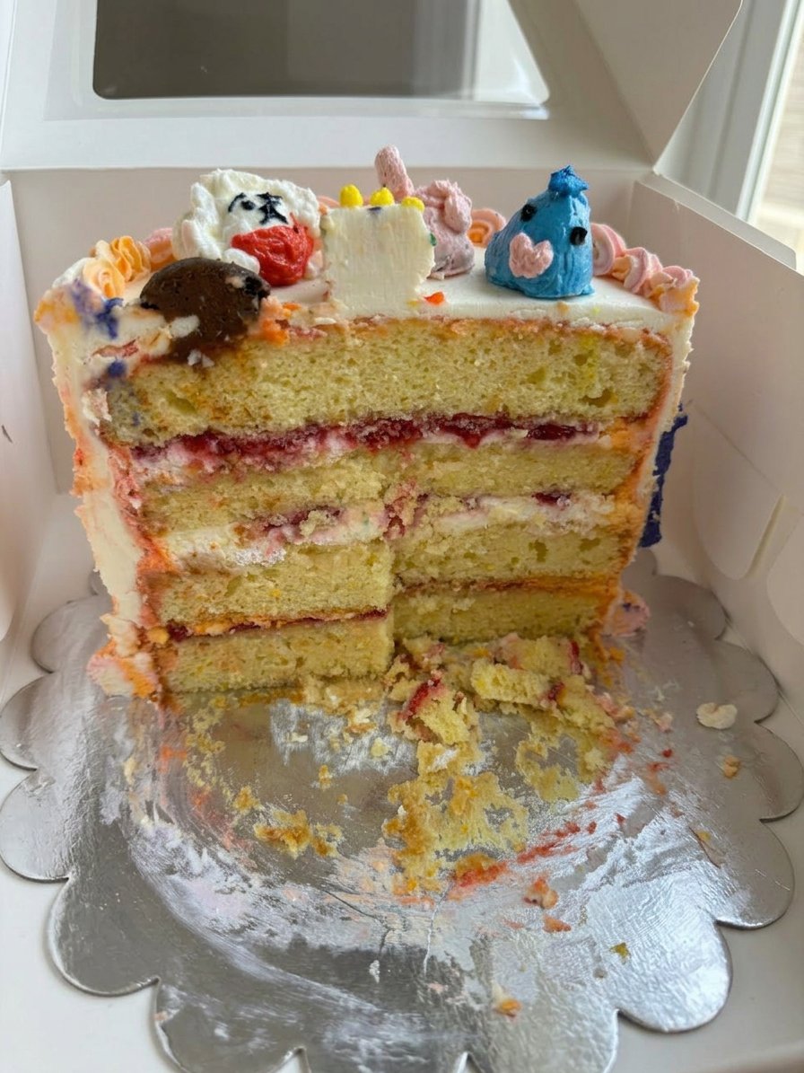 Bts Cake 13 Ateco 844 tip piping purple frosting swirls on top of a cake