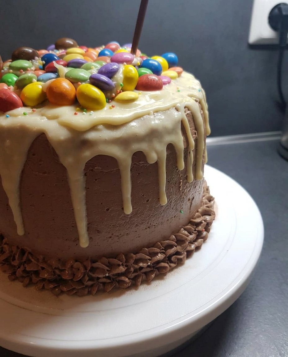 A four layer yellow cake with a surprise center filled with pastel candies