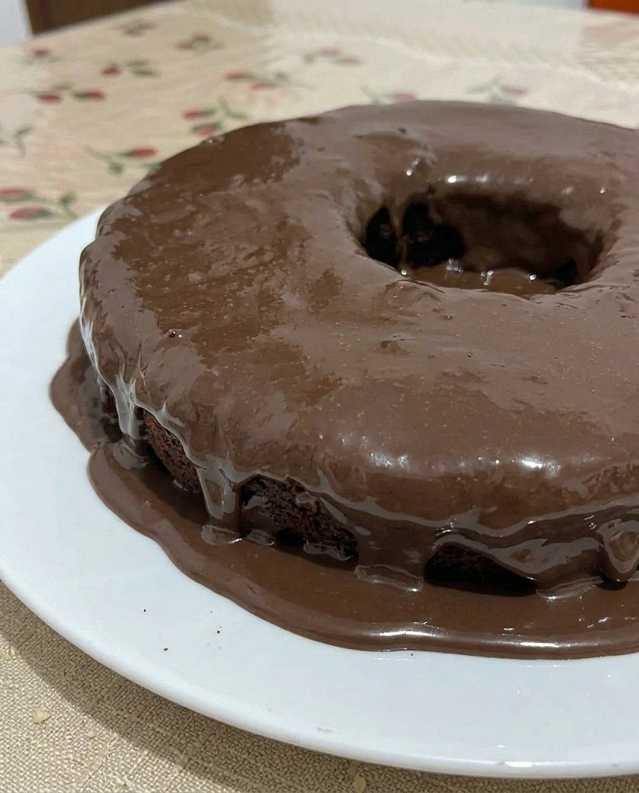 Close up of a moist chocolate cake crumb showing even air distribution