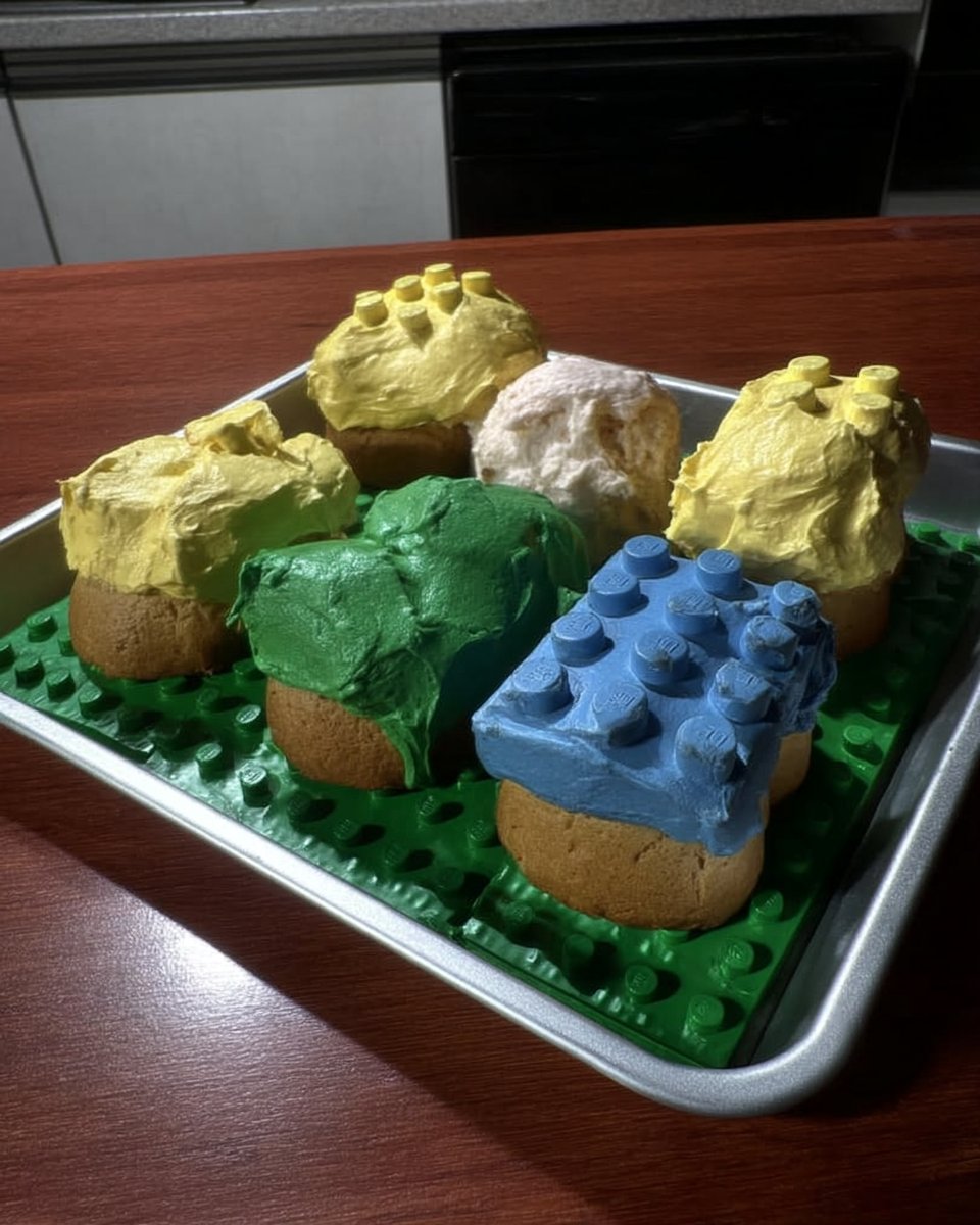 Lego Cake 13 Thick lemon icing dripping from a spoon for Lego cake