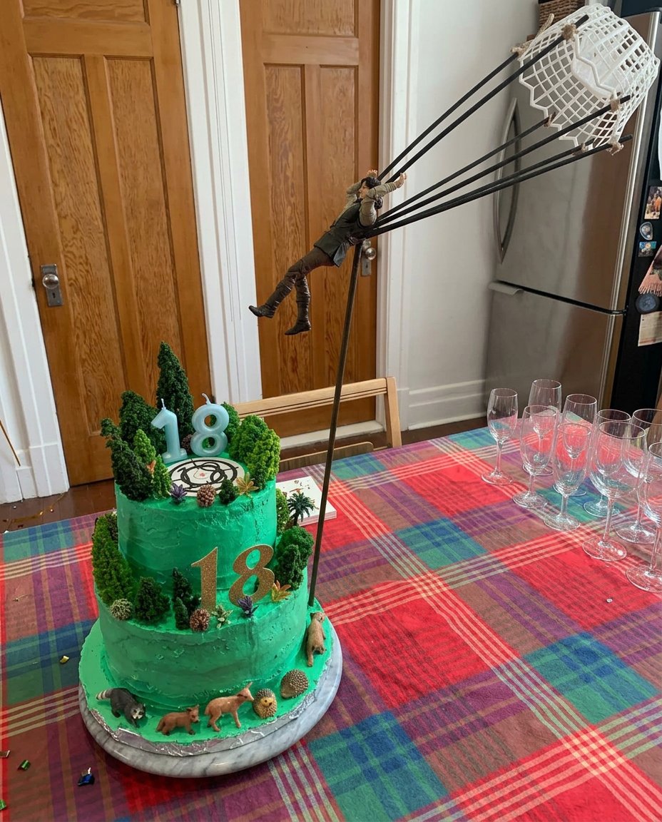 Finished 18th birthday cake decorated with macarons and roses