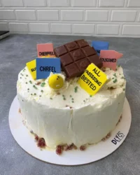 A close up of a sliced farewell cake showing the sprinkle distribution and dense crumb.