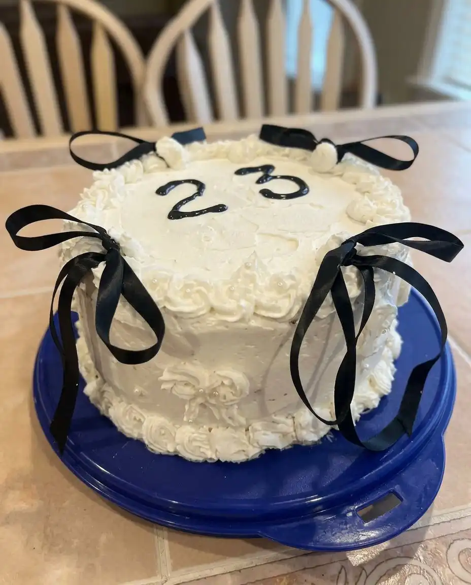 Cake For Birthday 12 Fresh brown eggs and a bowl of flour on a dark wood farmhouse table