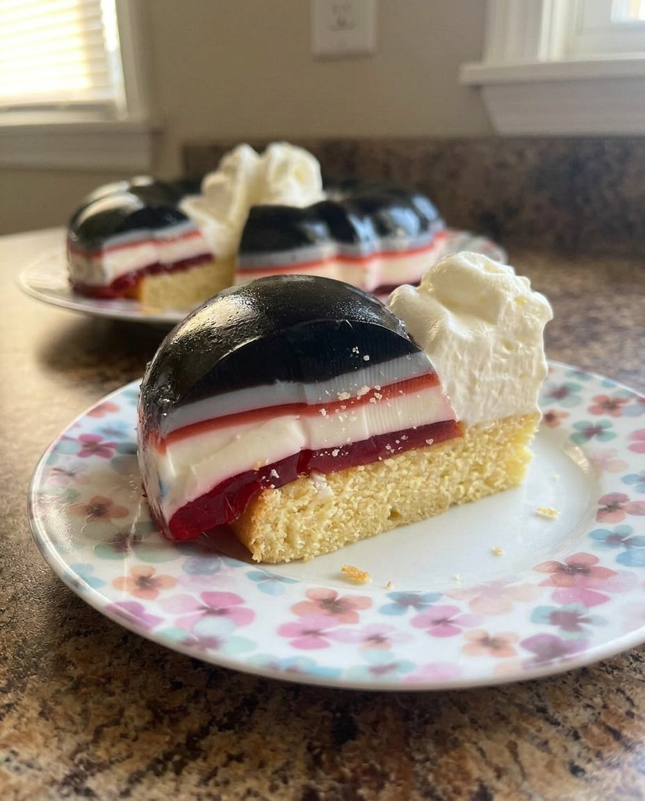 Jello Cake 12 Ingredients for jello cake including gelatin packets and fresh strawberries.