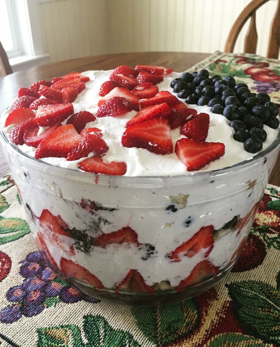 Ingredients for fruit cake including dried fruits, walnuts, and spices