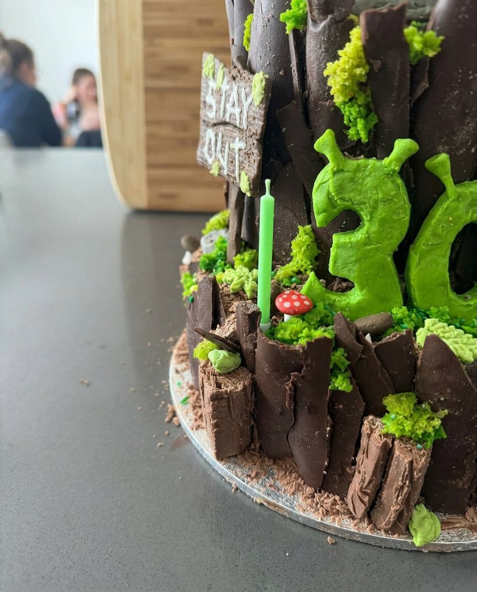 Shrek Cake 12 Detailed view of the dark chocolate and almond cake batter before baking.