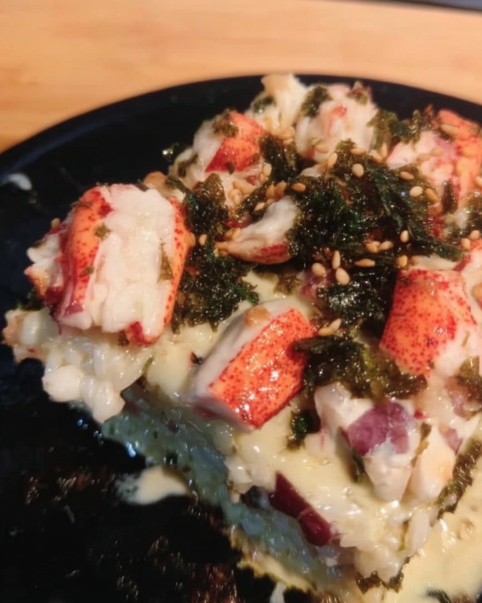 Sushi Cake 12 Short grain sushi rice being rinsed in a mesh strainer