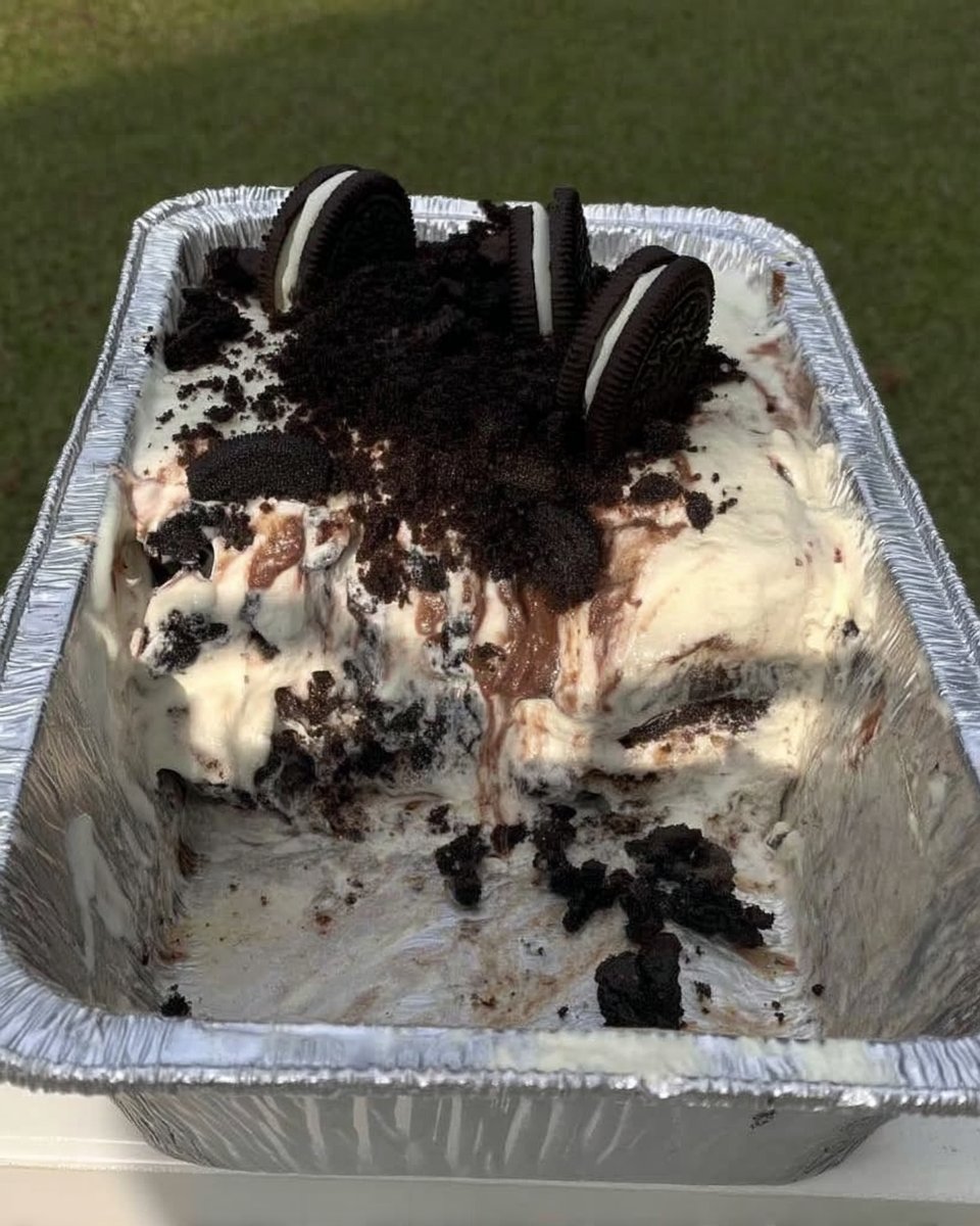 Oreo Icebox Cake 13 Soft billowy peaks of freshly whipped cream in a glass bowl