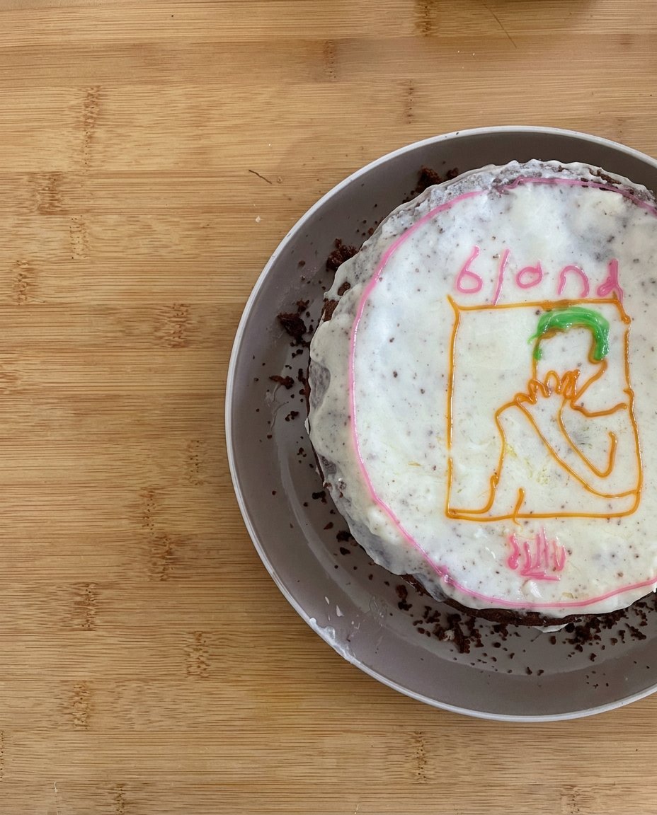 Sliced Frank Ocean Cake showing teal and blue interior rings