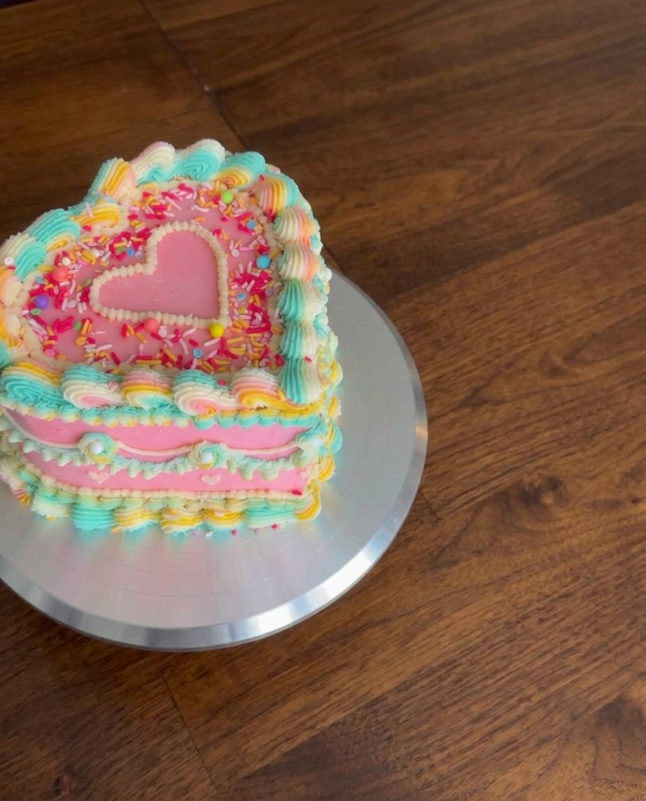 Cake Heart 12 Fresh ingredients for a heart cake including eggs, lemon, flour, and butter.