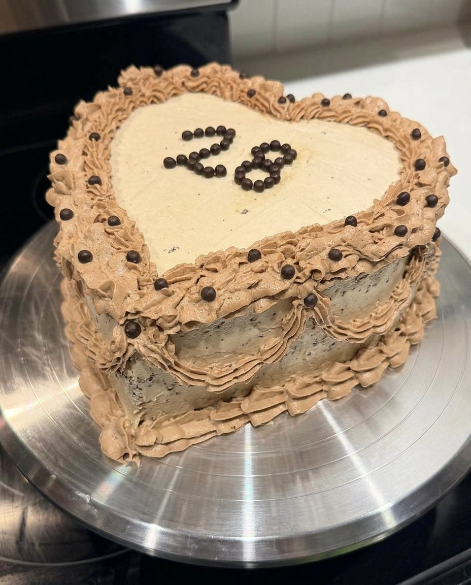 Cake Heart 14 A slice of heart cake showing the moist internal crumb and pink frosting.