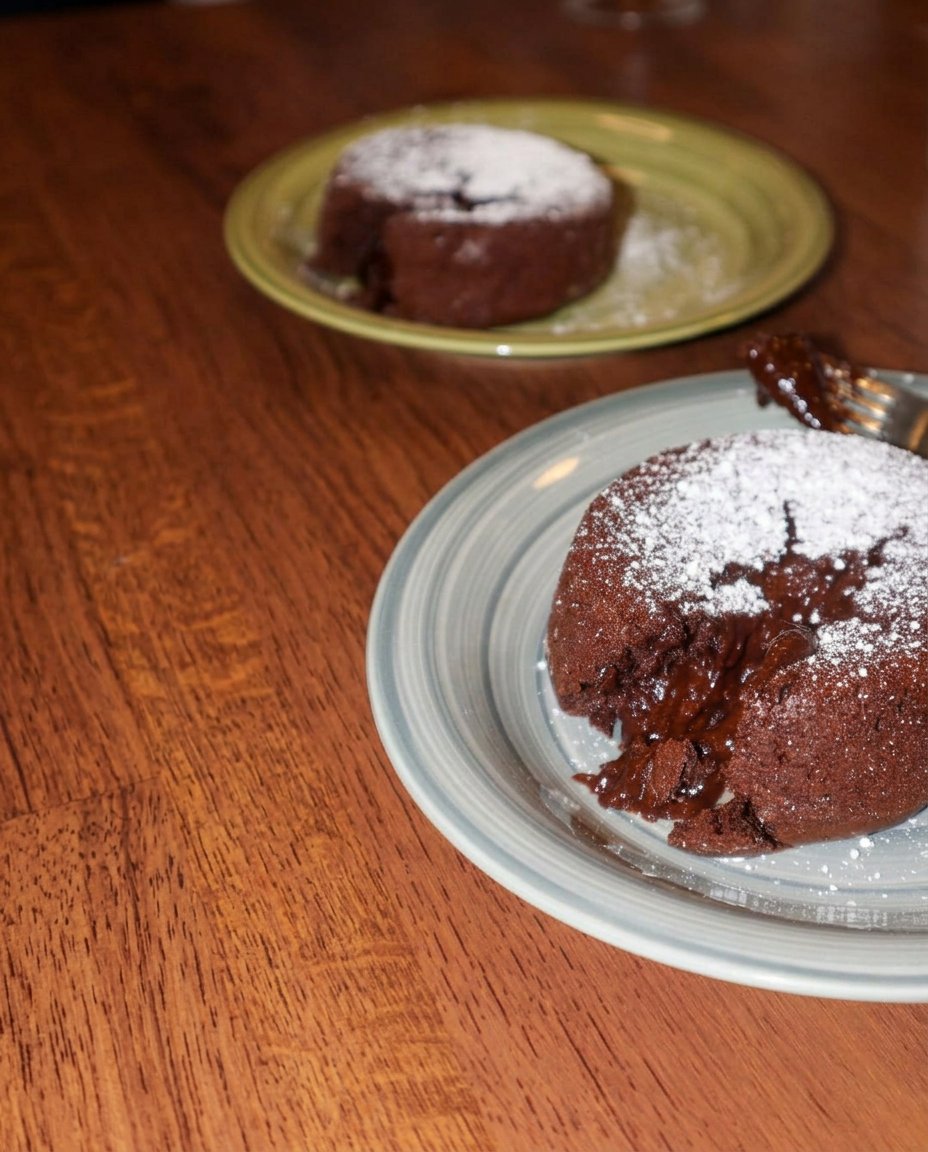 A close up of the smooth chocolate ganache center for a lava cake.