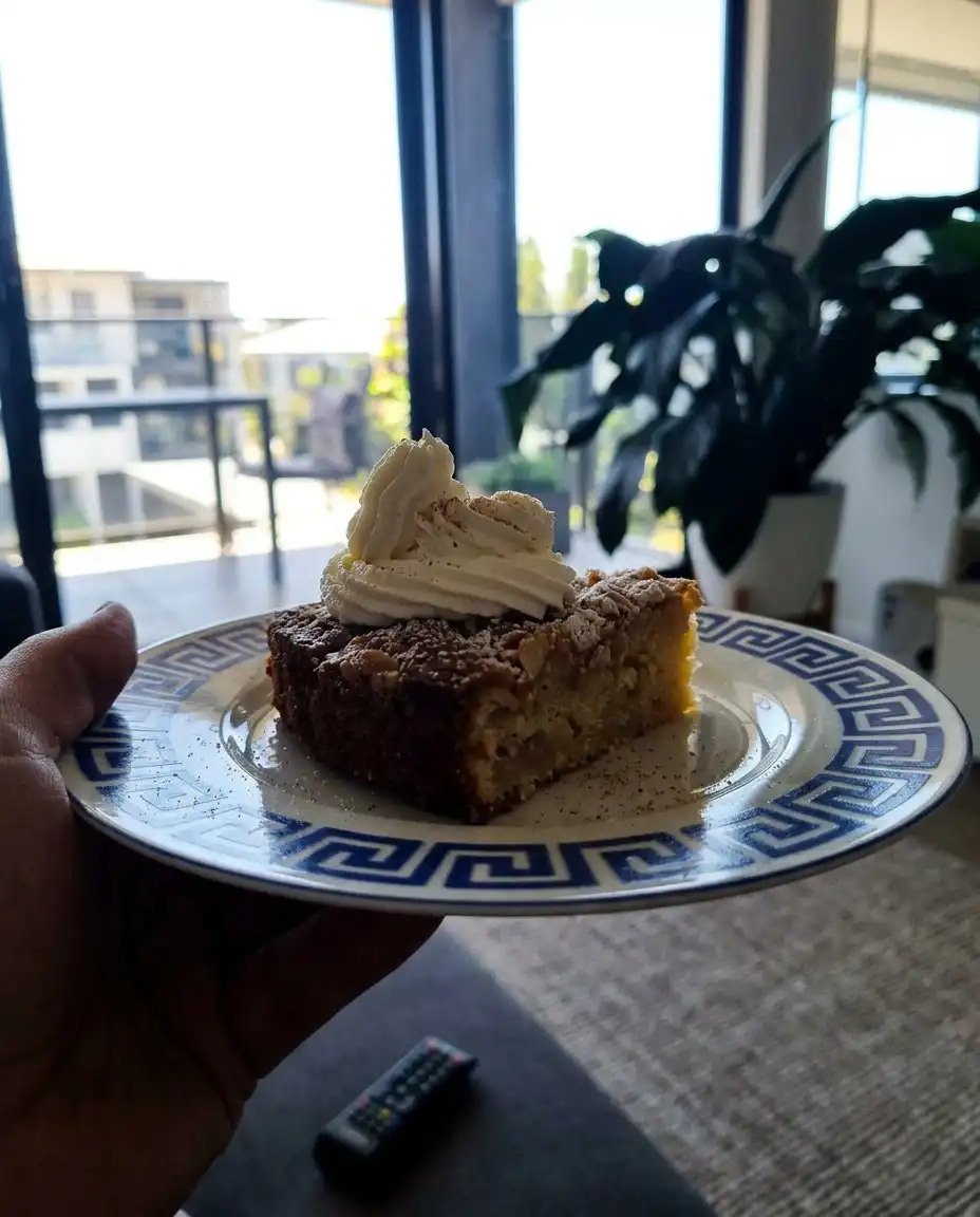 A skewer test showing a perfectly baked apple cake