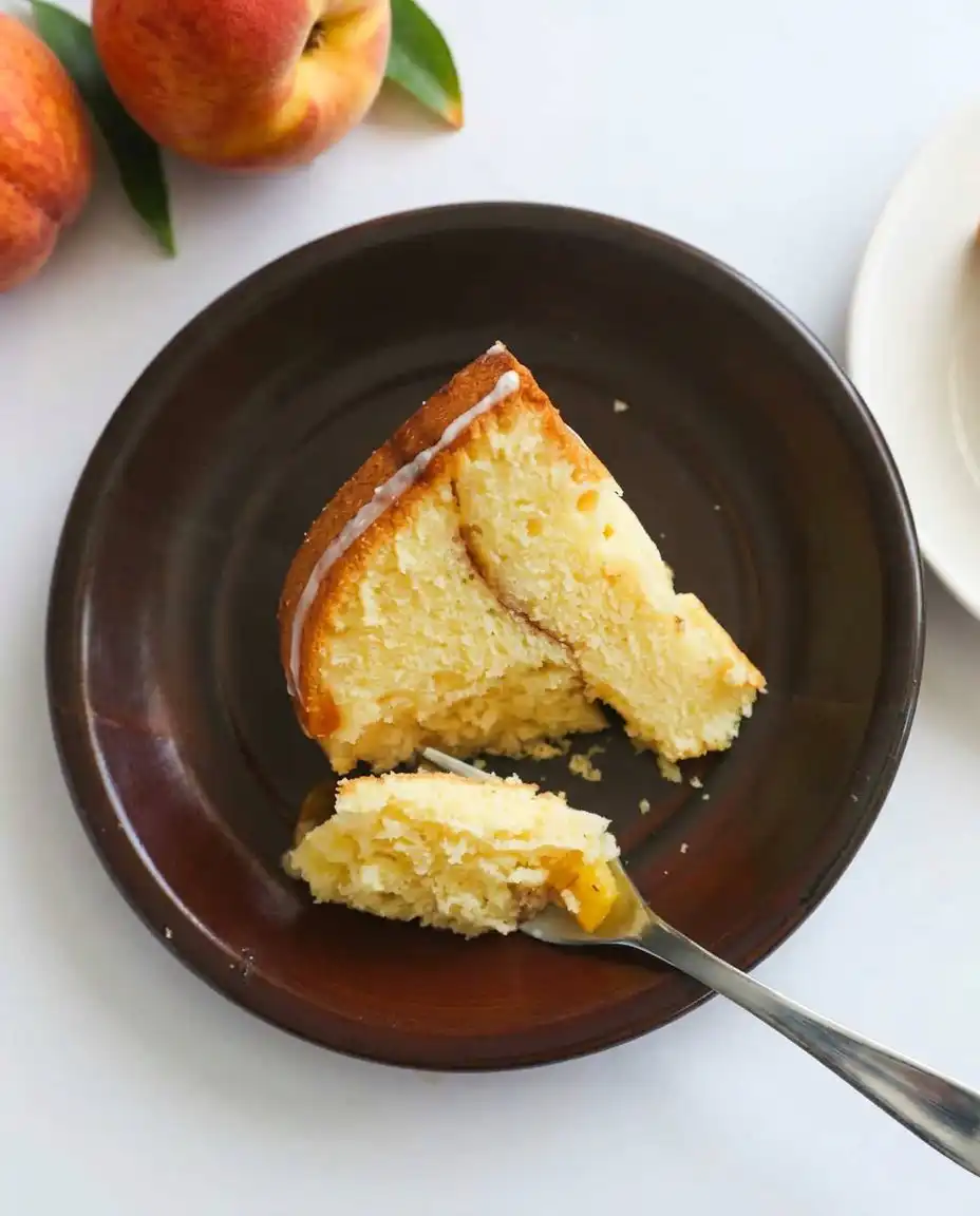 A close up of butter and sugar being creamed in a stand mixer until fluffy.
