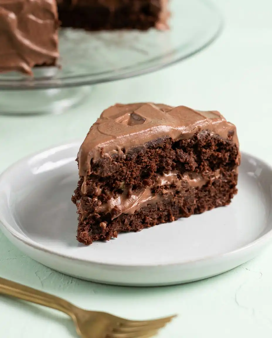 Dairy-Free Chocolate Zucchini Cake 12 A rich Dairy-Free Chocolate Zucchini Cake served in a rustic sheet pan with glossy ganache.