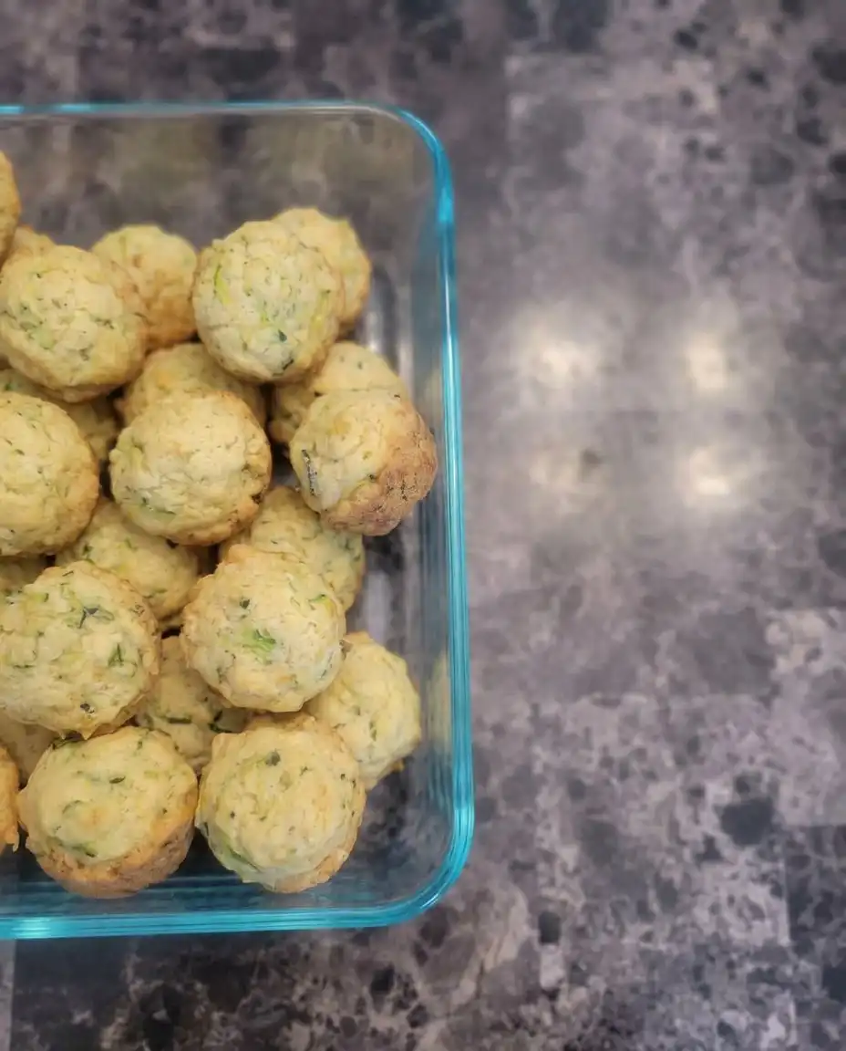 Finished zucchini coffee cake muffins with vanilla glaze