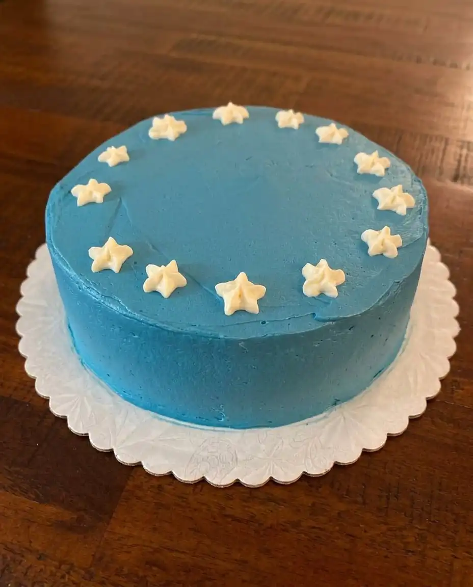 Ingredients for the red white and blue poke cake including cake mix and gelatin.