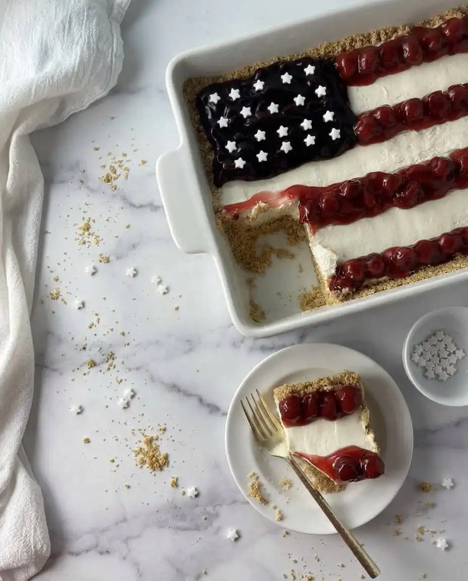 American Flag Cake No-Bake Cheesecake 14 Using a toothpick to score a grid pattern on a white cheesecake surface