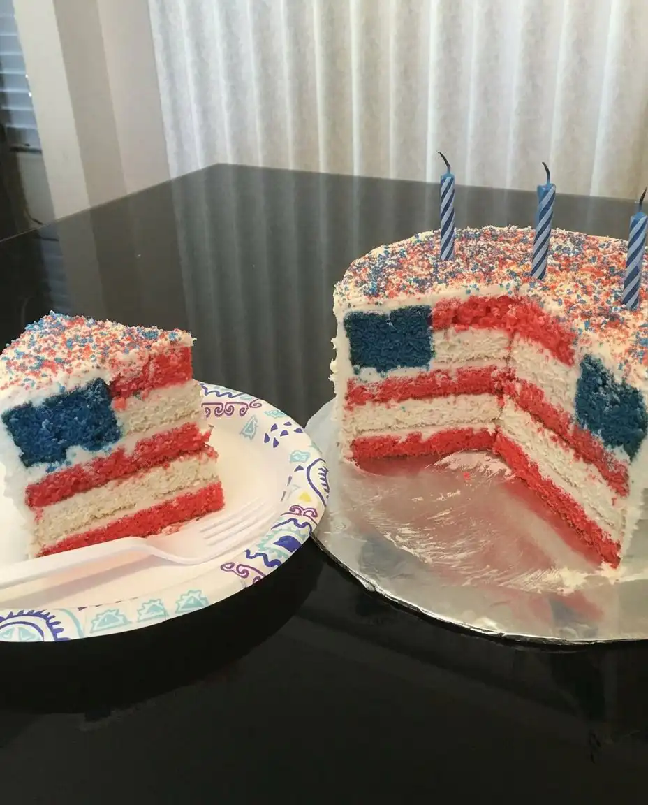 Red, White and Blue Layered Flag Cake 14 A slice of cake showing the internal American flag pattern