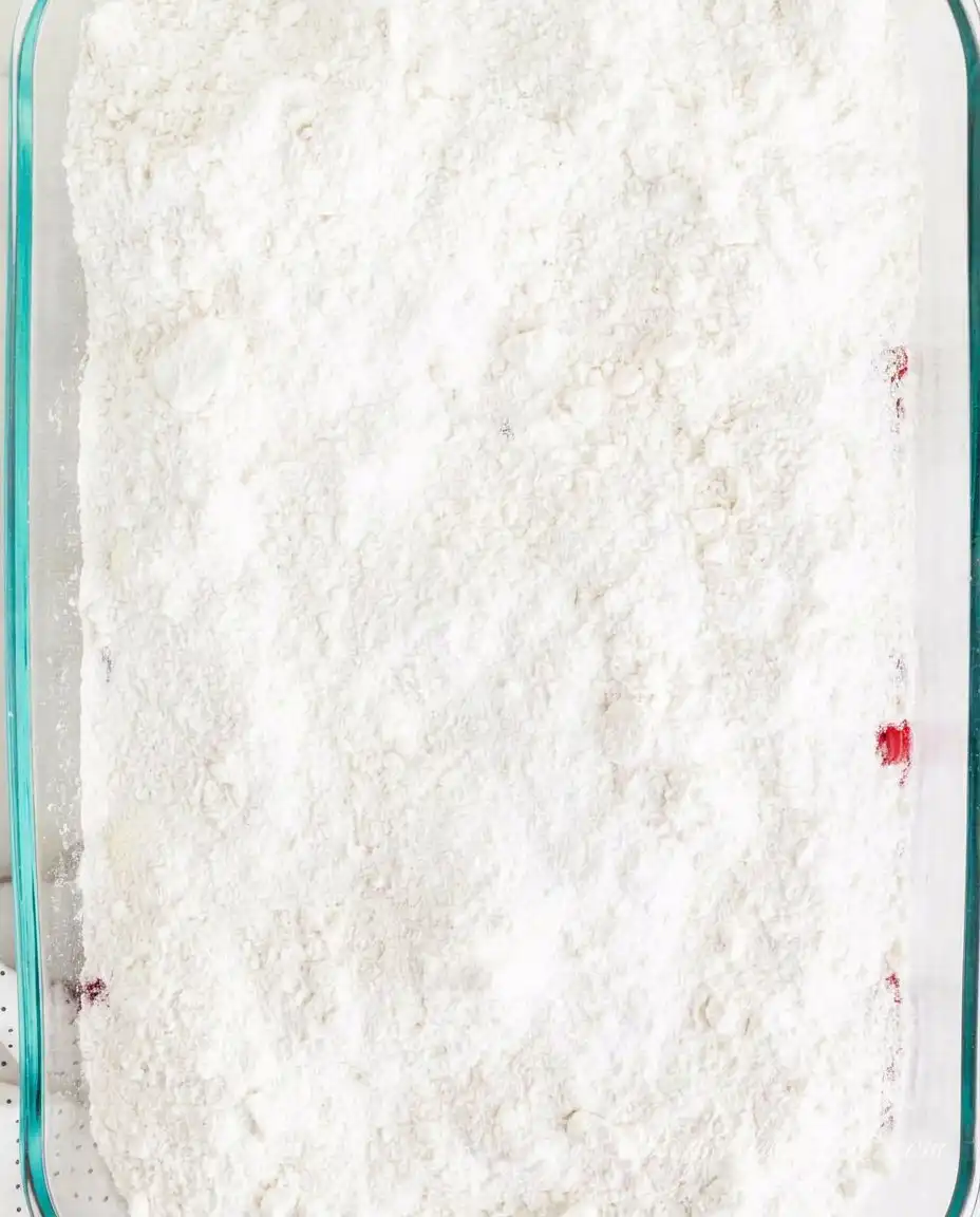 High quality strawberry pie filling spread in a baking dish