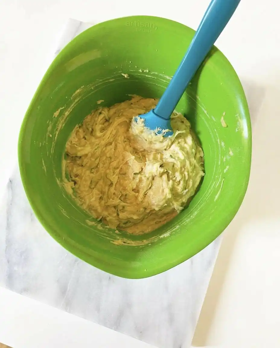 Ingredients for zucchini coffee cake muffins displayed on a counter