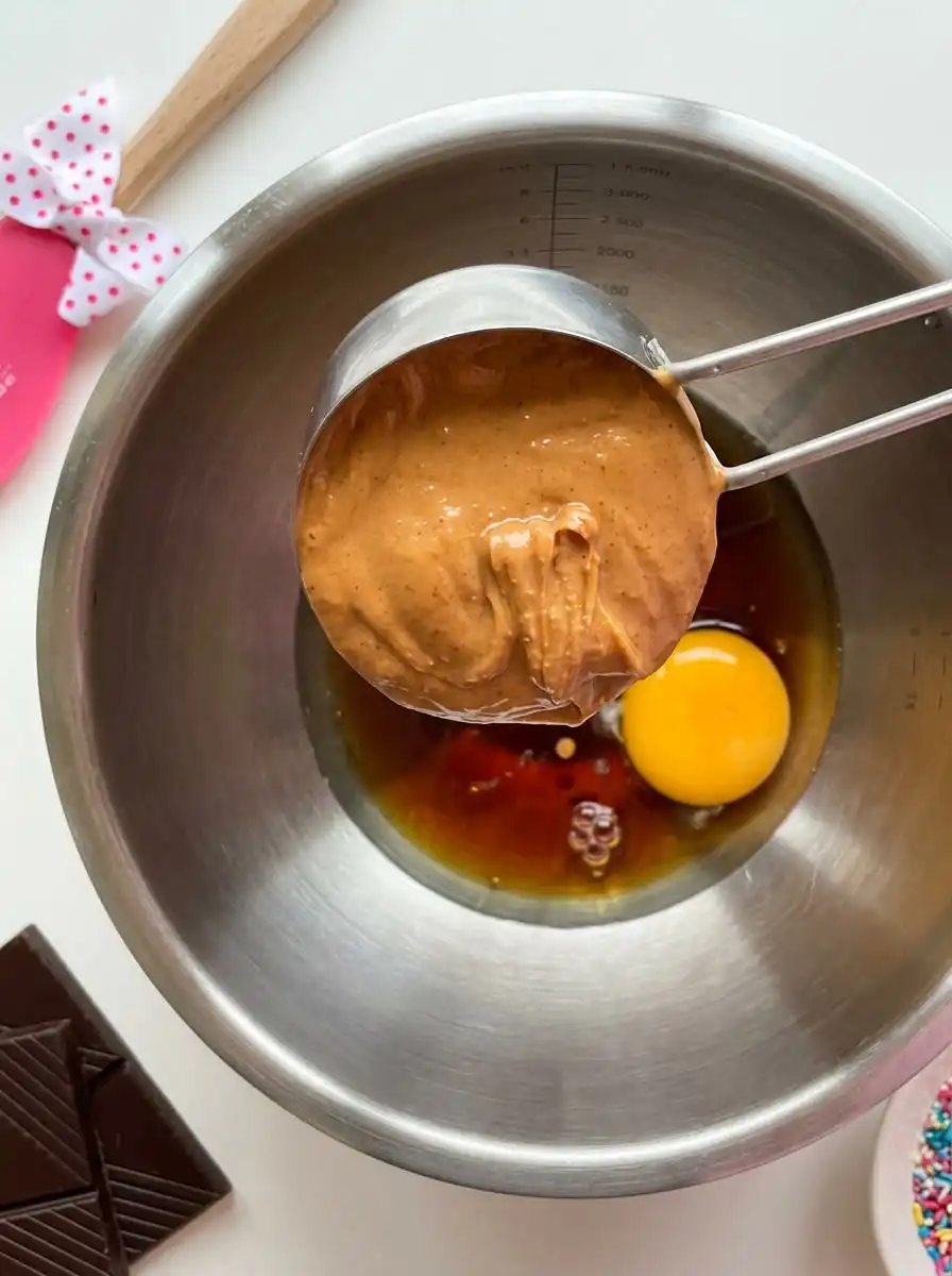 The simple ingredients assembled for making brownie cake pops including chocolate candy melts and fudge brownie mix