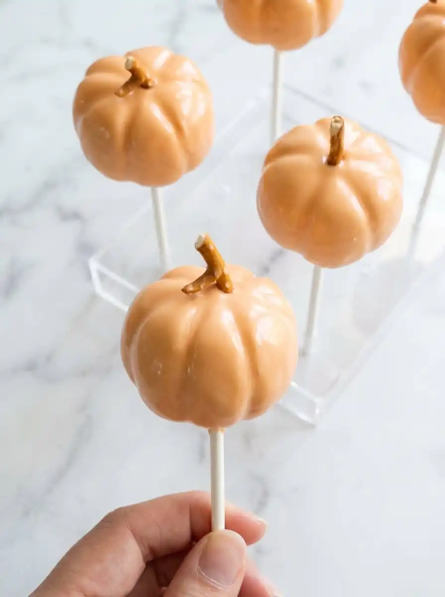 Classic Pumpkin Cake Pops served at a festive autumn gathering